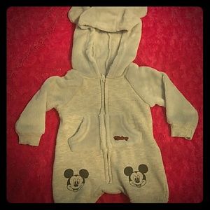 A sweater with a soft & leather material with hood